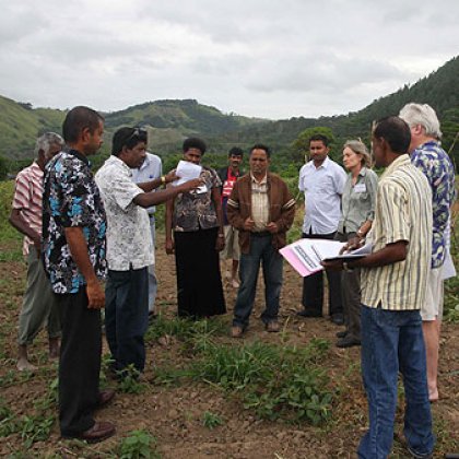 Workshop participants visit a farm to learn about the challenges faced by growers in producing vegetables for market