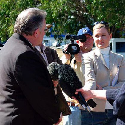 Bruce Redman (centre) films Family First candidate John Lewis during the 2004 Federal Election campaign