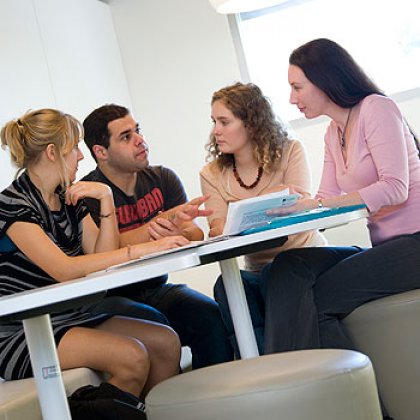 Students Jocelyn Farebrothere, Joel Wright and Tess Millerick participate in group work with lecturer Dr Katelyn Barney