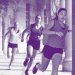 Three female athletes running around sandstone building with purple overlay.