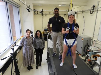 In the UQ neuromuscular biomechanics laboratory with the VR balance rig are (from left) Associate Professor Taylor Dick from the School of Biomedical Sciences, Senior Lecturer Dr Nilufar (Nell) Baghaei from the School of Electrical Engineering, Electrical Engineering and Computer Science PhD scholar Achintha Abayasiri and UQ research scholar Anastasia Polach. Credit: UQ