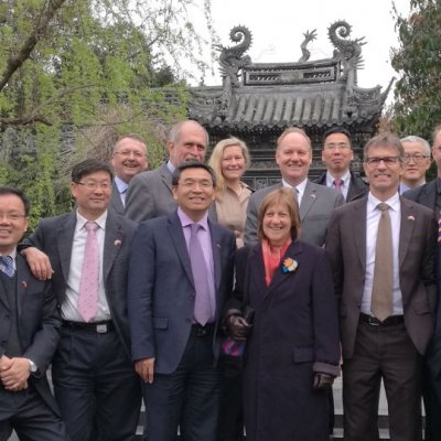 The group of executives after the signing, in Shanghai's Yuyuan Garden. 