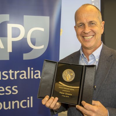 Peter Greste with his award