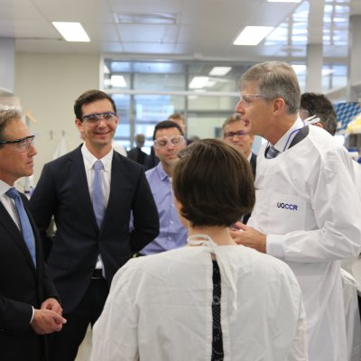 Professor David Paterson with Federal Minister Greg Hunt and others in the laboratory