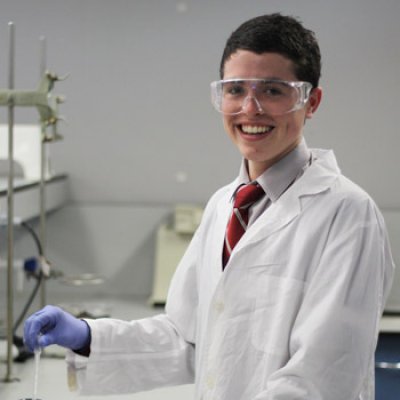 Oscar Saez from Clairvaux MacKillop College participates in the ‘Anodise, Polymerise and Photolyse’ chemistry workshop.