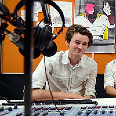 UQ Summer Research Program students Daniel Rawlinson and Lanz de Jesus in a JAC Radio recording room at the School of Journalism and Communication