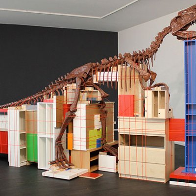 Claire Healy and Sean Cordeiro, ‘Future Remnant’ 2011, dinosaur fossil replica, IKEA furnishings, cable binding, 285 x 180 x 485 cm irreg. 
Courtesy of the artists and Nature Morte, Berlin and Gallery Barry Keldoulis, Sydney and © the artists