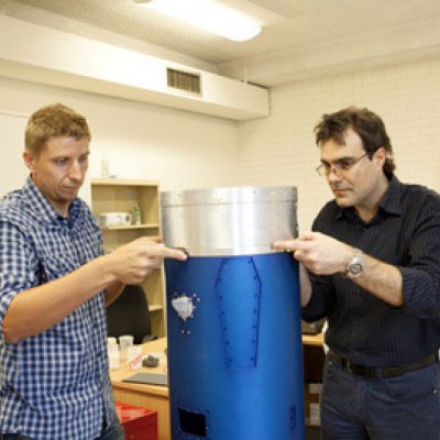 In the early stages of the scramjet's assembly, Dr Sandy Tirtey of UQ and Dr Roberto Gardi of Italian Aerospace Research Centre (CIRA) attach winglets made of a ceramic material which will be tested on its flight in Norway this year.