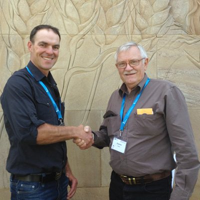UQ Diploma of Agriculture Graduate Paul Roderick with trainer Graeme Busby.