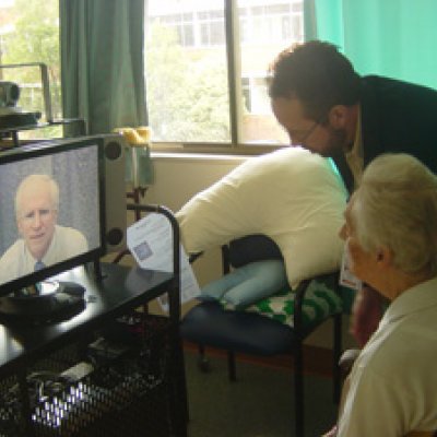 UQ’s Professor Len Gray consults with a patient using telehealth.