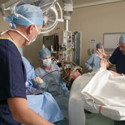 World leaders in deep brain stimulation, Professor Peter Silburn, Associate Professor Terry Coyne and his team.