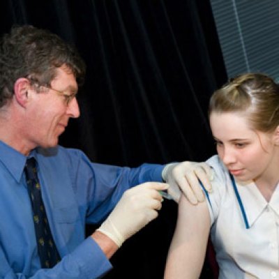 Professor Ian Frazer with the Gardasil vaccine.