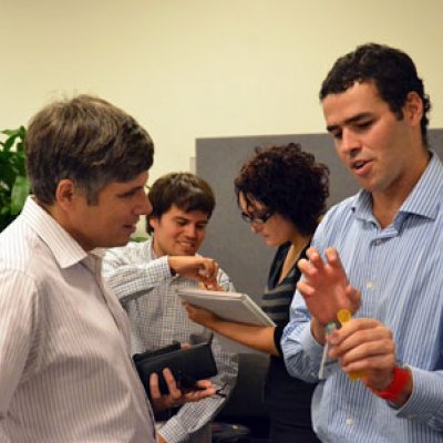 Chilean engineering student Samuel Valdes (right) discusses a research project with Professor Paul Strooper, Head of School, Information Technology and Electrical Engineering.