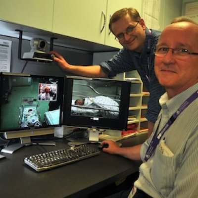 Award winning: Dr Nigel Armfield and Dr Tim Donovan have developed a telemedicine trial that enables specialists to assess sick infants in regional and country areas. Photo: Queensland Health