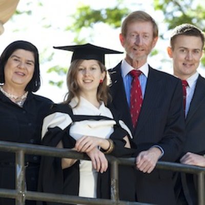 Family tradition: Elizabeth Mathews shares her graduation day joy with her parents Peter and Robyn-Ann and her brother James, who are all UQ alumni.