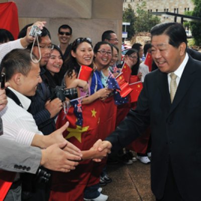 University of Queensland students meet His Excellency Mr Jia Qinglin, Chairman of the National Committee, Chinese People's Political Consultative Conference on his arrival at UQ