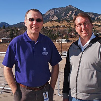 UQ PhD student Michael Hewson with Dr Steve Peckham on the rooftop of the David Skaggs Research Centre in Colorado. Image courtesy Will von Dauster