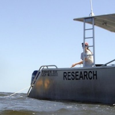 UQ Researchers deploying marine monitors in Moreton Bay.