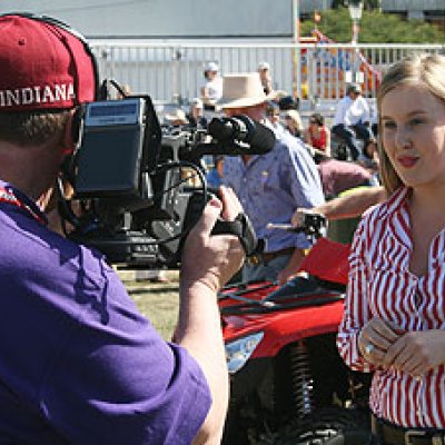 Industry Consultant Bruce Redman and journalism student Philippa Coore at the Ekka
