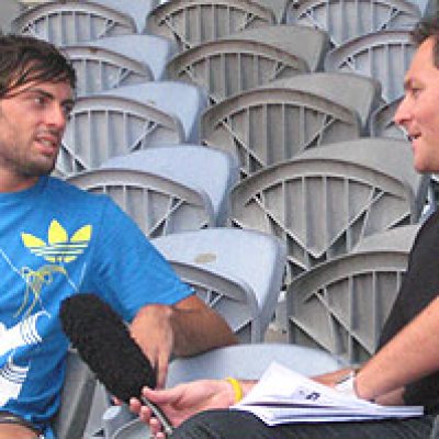 Mitchell Watt is interviewed by Channel 7 at the UQ Athletics Centre