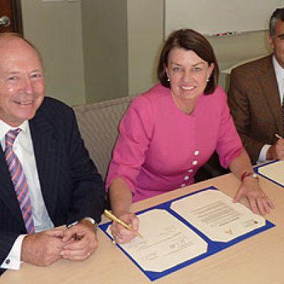 L-R: Professor Peter Gray, AIBN Director, Queensland Premier Anna Bligh, John Melo, CEO of Amyris Biotechnologies.