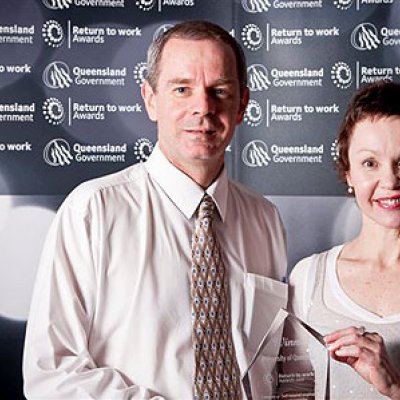 UQ Self-Insurance Manager Rod Knights and Ms Fraser with the award