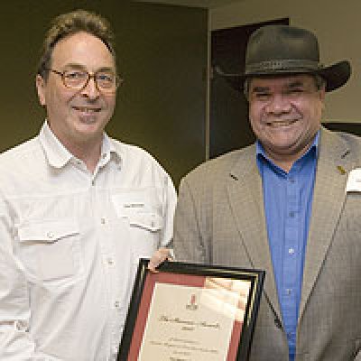 Professor Paul Memmott receiving the Stanner Award from Professor Mick Dodson at the Australian Institute of Aboriginal and Torres Strait Islander Studies.
Photo courtesy Australian Institute of Aboriginal and Torres Strait Islander Studies (AIATSIS)