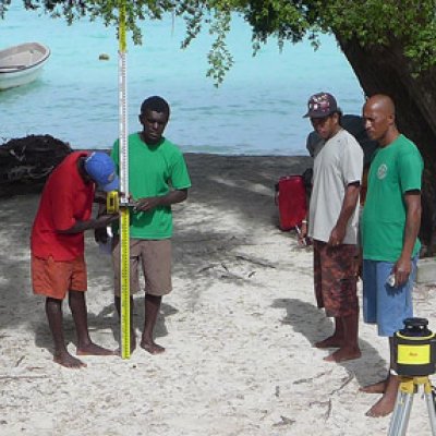 Global Change Institute scientists are working with local communities to monitor sea level rise in the Solomon Islands, a region which has experienced some of the highest climate change-related sea level rise in the world. Photo: Dr Javier Leon.