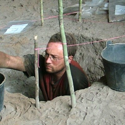  Dr Andy Fairbairn gets down and dirty on a dig.