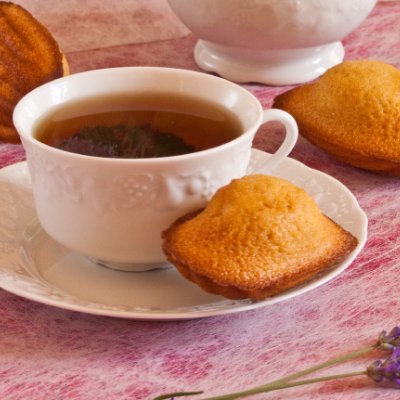 Photo of madeleine cakes and tea here
