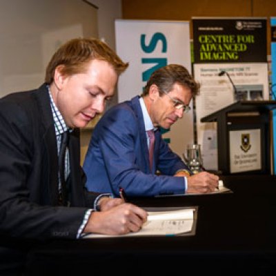 UQ Vice-Chancellor Professor Peter Høj and Toby Carrington, Vice President Finance for Siemens Healthcare in Australia and New Zealand.