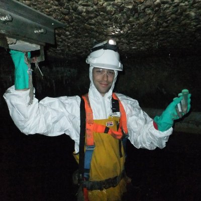 Dr Barry Cayford, who completed his PhD at UQ, at work on sewer research