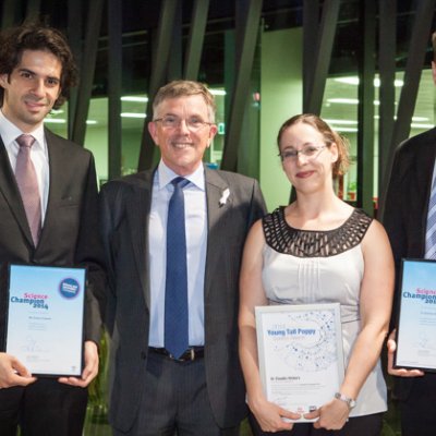 UQ's three award winners, from left, Hosam Zowawi, Claudia Vickers and Andrew Stephenson, with the Minister for Science, Ian Walker (second from left)