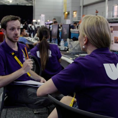 Students Andrew Thorpe, Bo Daly and Evangelene Dickson inside the media centre at the G20. Photo: Genevieve Worrell.