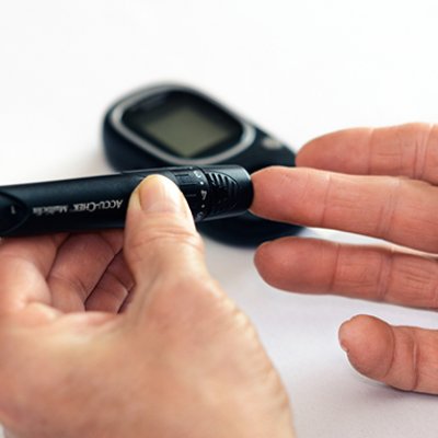 A diabetic performs a pin-prick test.