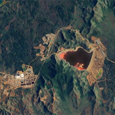 a satellite image of a nickel mine surrounded by trees