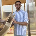 UQ researchers Associate Professor Joe Gattas (left) and PHD student Mahmoud Abu-Saleem with one of their timber-cardboard web-core sandwich (TCWS).