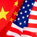 The Chinese and American flags side by side.