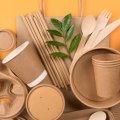 a pile of brown boxes, cups and utensils