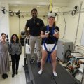 In the UQ neuromuscular biomechanics laboratory with the VR balance rig are (from left) Associate Professor Taylor Dick from the School of Biomedical Sciences, Senior Lecturer Dr Nilufar (Nell) Baghaei from the School of Electrical Engineering, Electrical Engineering and Computer Science PhD scholar Achintha Abayasiri and UQ research scholar Anastasia Polach. Credit: UQ
