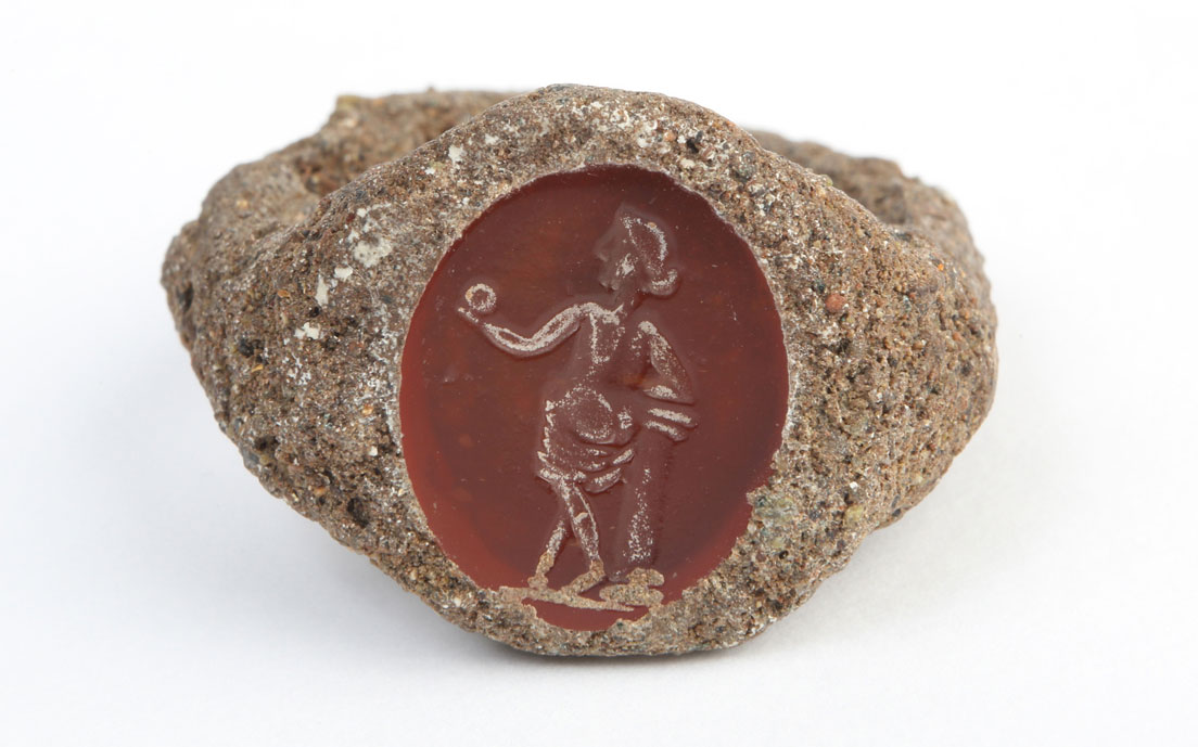  Ring with Aphrodite holding an apple, Cornelian and Iron, Roman, AD 1 – 200. On loan from Mr G Slater, Brisbane, 2001.