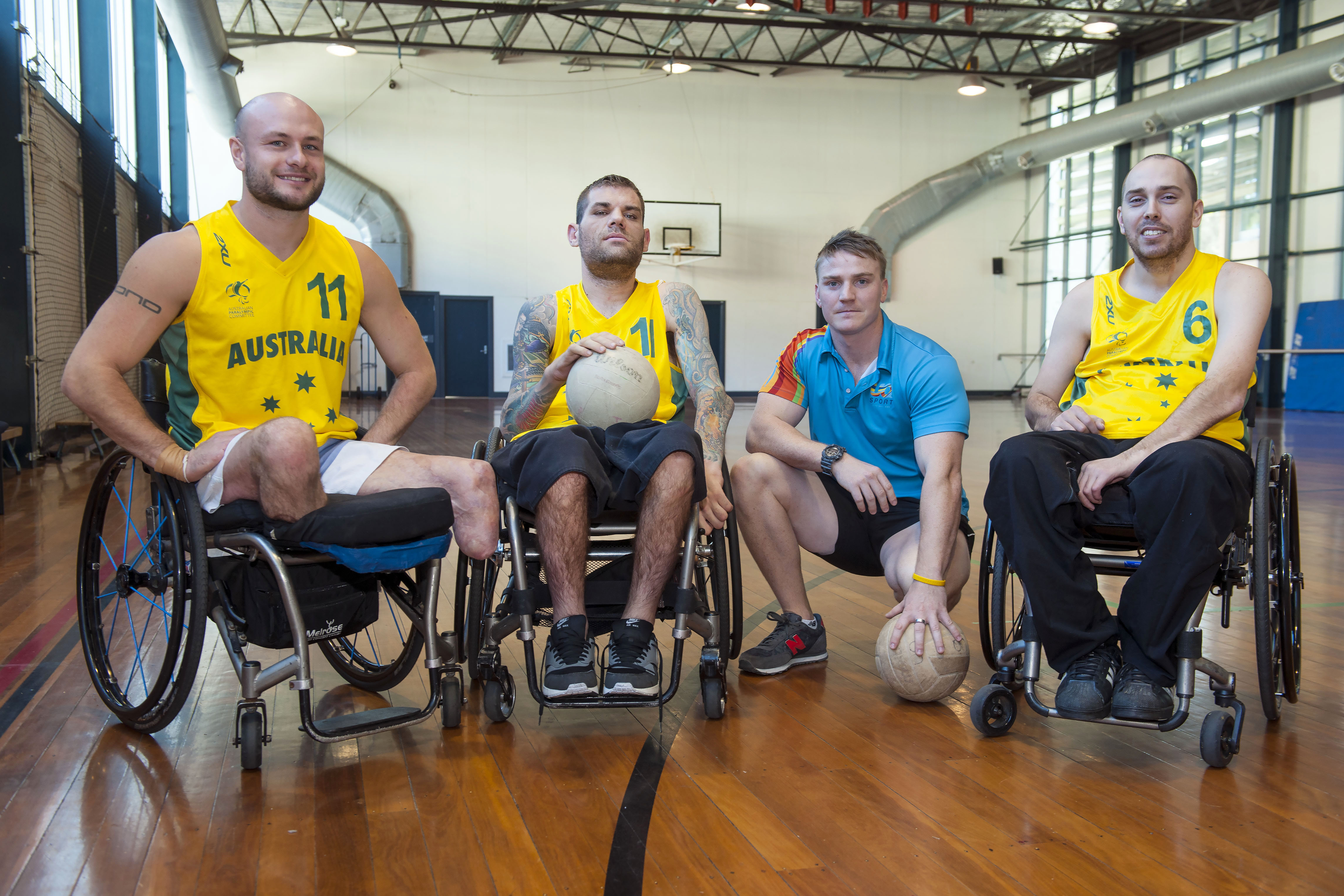 Elliot Jackson with members of the Australian wheelchair rugby team