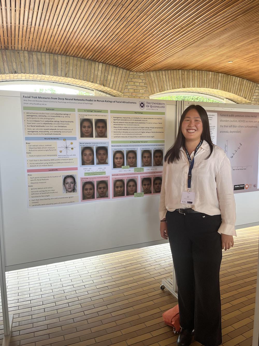 Amy Zhao standing in front of a white board