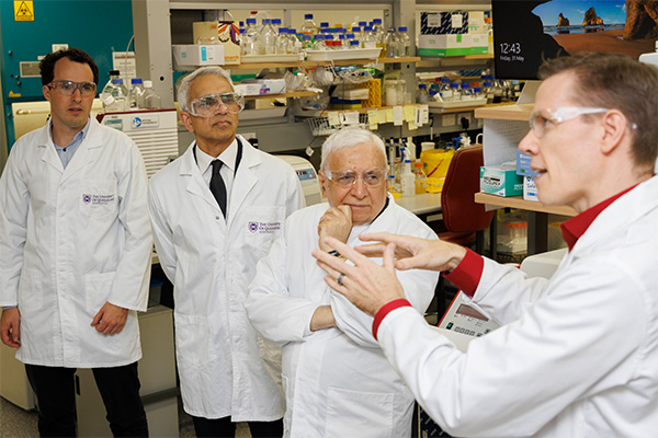 Rafi Ahmed (second from right), director of the Emory Vaccine Center in the United States and Ravi Thadhani (second from left), executive vice president for health affairs at Emory University, visiting colleagues at The University of Queensland.