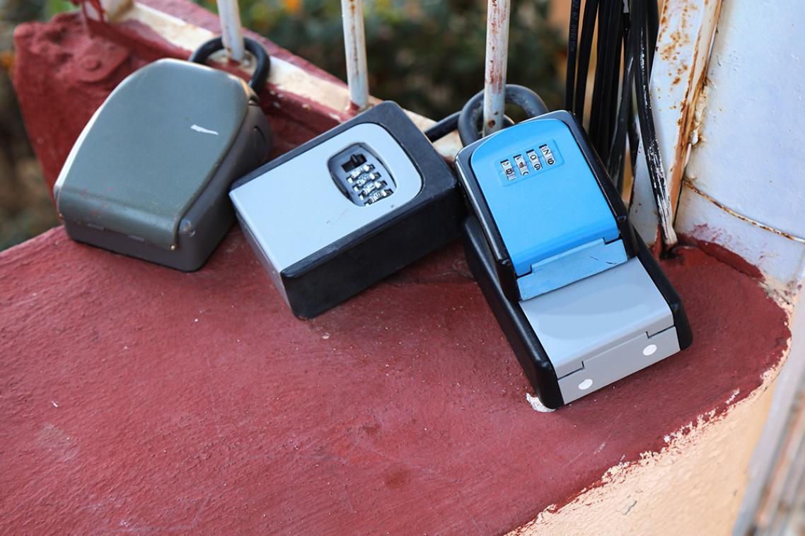 Mechanical locks attached to a fence 